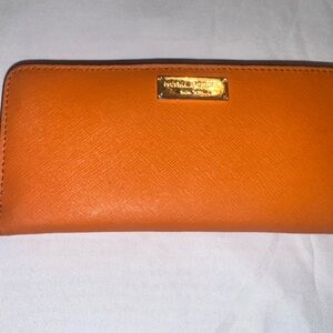 Henri Bendel Orange Wallet with Gold Hardware